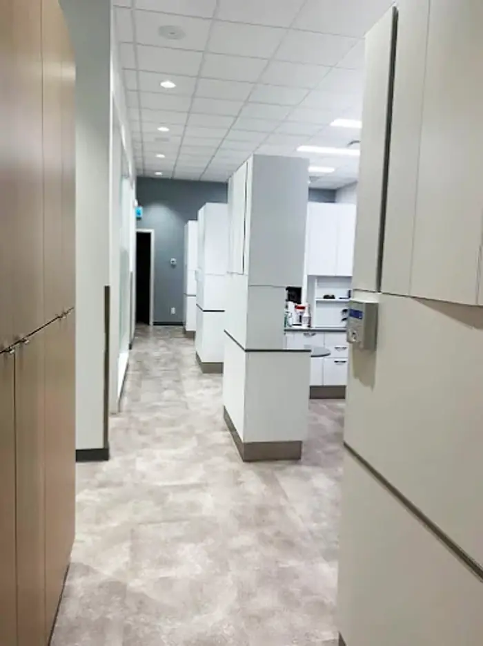 Bright treatment corridor inside the Allard Station Dental clinic