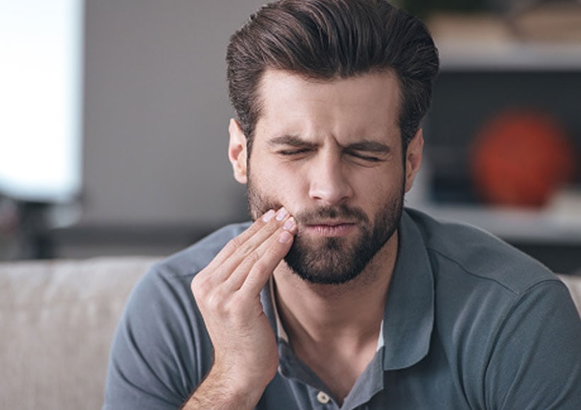 Adult patient relaxed and pain-free after starting TMJ treatment